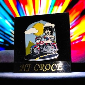 The famous Betty boop riding free on a motorcycle in 3D